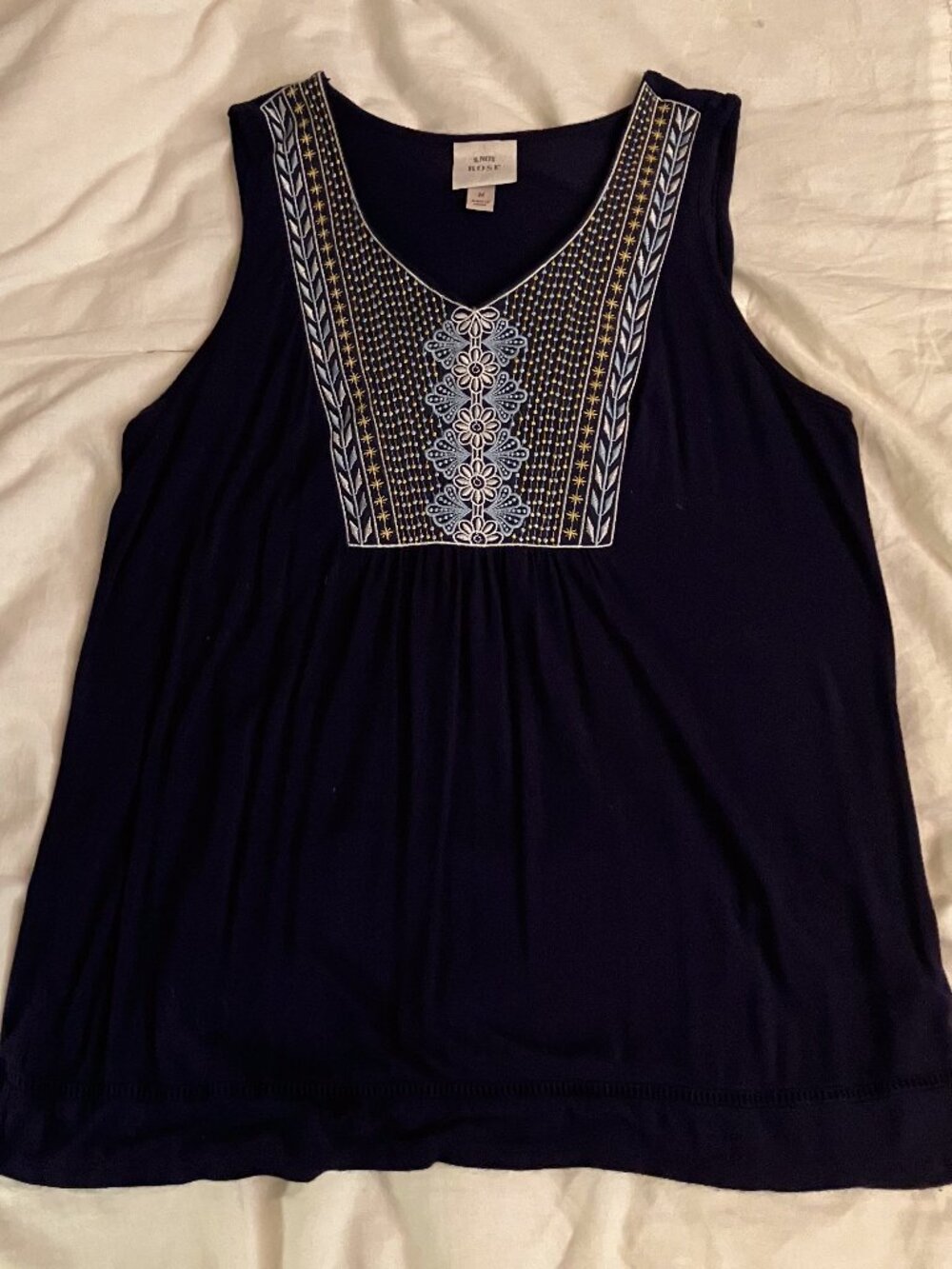 Cute flowy knot tank with embroidered design